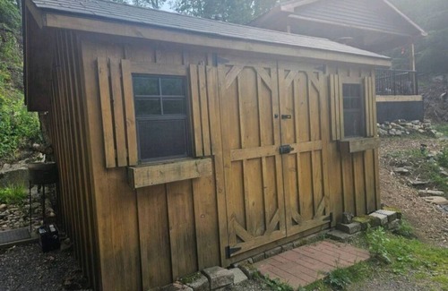 Wollaston Cabin | Cozy Glamping retreat in the forest on our Off grid land.