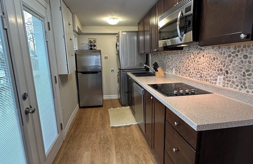 Grand Bend House | Cozy Grand Bend Cottage steps to the beach and the main strip with large deck!