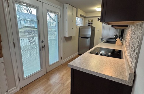 Grand Bend House | Cozy Grand Bend Cottage steps to the beach and the main strip with large deck!