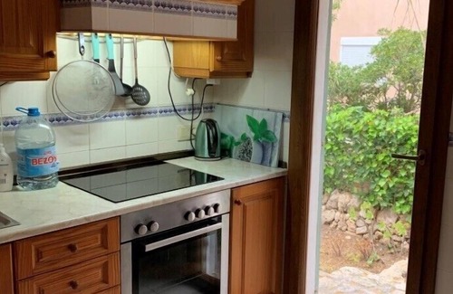 Cala Llombards Ski Chalet | Cozy holiday home with a beautiful sea view from the roof!