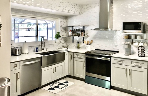 Citrus Park House | Cozy Lake House with Heated Salt Water Pool