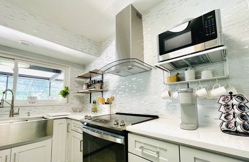 Citrus Park House | Cozy Lake House with Heated Salt Water Pool