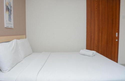 Pekayon Jaya Apartment | Cozy Living 1BR at Grand Kamala Lagoon Apartment By Travelio