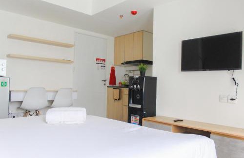 South Tangerang Apartment | Cozy Living Studio Room at Urbantown Serpong Apartment By Travelio