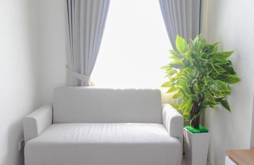 South Tangerang Apartment | Cozy Living Studio Room at Urbantown Serpong Apartment By Travelio