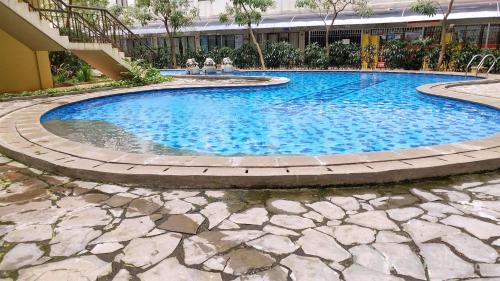 Kebagusan Apartment | Cozy Living with Modern Design 1BR Kebagusan City Apartment By Travelio