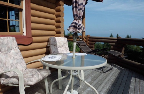West Bay House | Cozy log cabin with fantastic views and 2 bathrooms