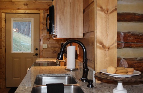 Upper Tract Cabin | Cozy Log Cabin in the Heart of Smoke Hole Canyon Overlooking South Branch River.