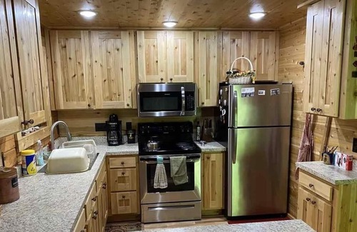 Gould City House | Cozy LOG CABIN in the woods