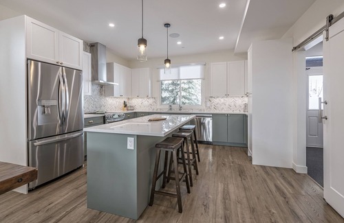 Silver Star Mountain House | Cozy modern duplex with hot tub, BBQ, garage, A/C, media room, large gear room