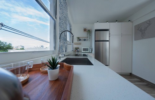 Santurce Apartment | Cozy & Modern. In the heart of San Juan, steps from la Placita.nRenovated apt.