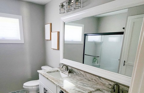 Saylorville House | Cozy, modern stay perfect for families. Fully fenced and private back yard.