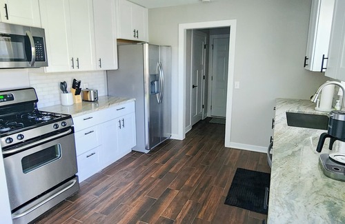 Saylorville House | Cozy, modern stay perfect for families. Fully fenced and private back yard.