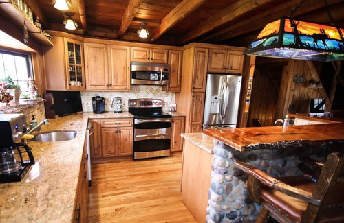 Stevenson House | Cozy Moose Log Cabin - Pool, Trails, Secluded Retreat