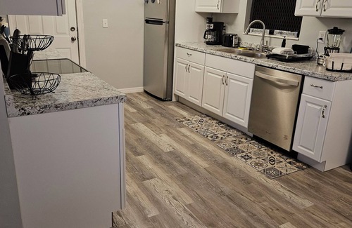 Riviera Beach House | Cozy Near The Beach is < 2 mi from the beach. Six beds. Sleeps 8 comfortably.