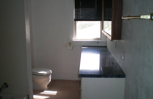 Minot House | Cozy Nostalgic 2 bedroom, 1 1/2 Bath 2 Story Home With fence, deck & garage.
