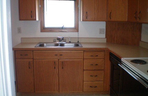 Minot House | Cozy Nostalgic 2 bedroom, 1 1/2 Bath 2 Story Home With fence, deck & garage.