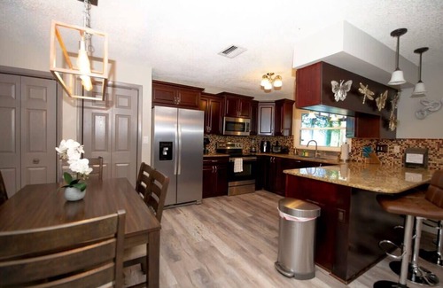 Palm Harbor House | Cozy Palm Harbor Family Oasis | Heated Pool & Spa | Pet-Friendly | Near Honeymoo