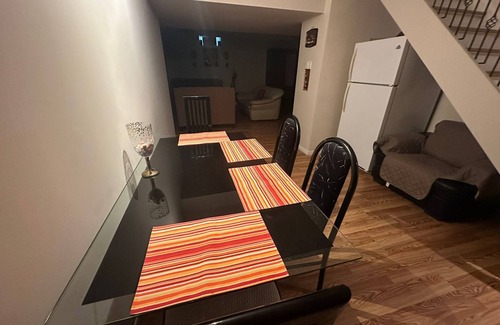 Brampton House | "Cozy, private basement with kitchenette, washroom, and small gym.