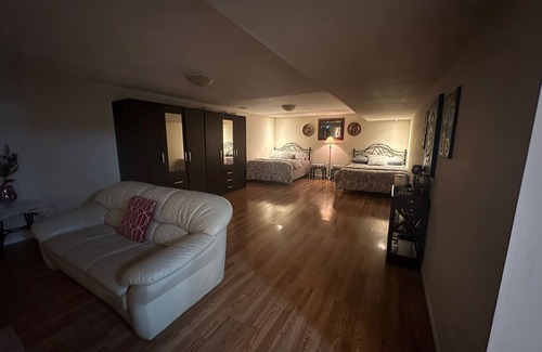 Brampton House | "Cozy, private basement with kitchenette, washroom, and small gym.