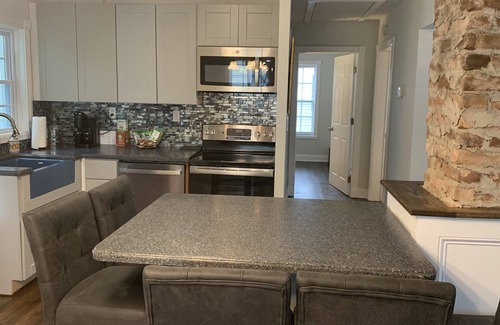 Covington House | Cozy renovated cottage with walking distance to downtown Covington and hospital.