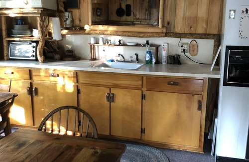 Island Park Cabin | Cozy rustic cabin on wooded 1 acre