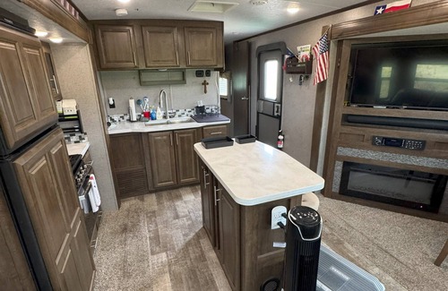 Comfort House | Cozy RV with AC and fitness room in Comfort, Texas in the hill country.