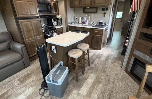 Comfort House | Cozy RV with AC and fitness room in Comfort, Texas in the hill country.