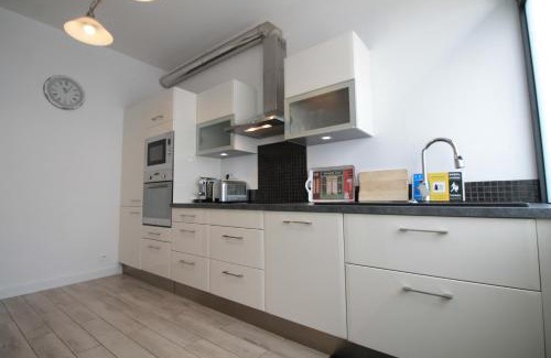 Quartier de la Maison-Blanche Apartment | Cozy Select