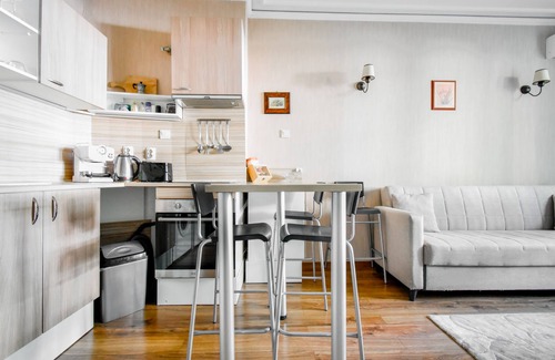 Sofia City Center Apartment | Cozy Stay: AC, Full Kitchen & Comfy Bed w/Dark Curtains