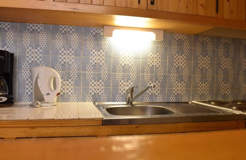 Meribel Apartment | Cozy Studio for 4 in Méribel – Ski Nearby, Fireplace, Modern Amenities