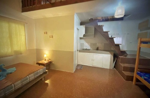 Catangnan House | Cozy studio for group of friends or family in General Luna with WiFi and AC