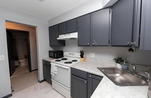 West Ridge Apartment | Cozy Studio Getaway Walk to Dining and Shops + Laundry