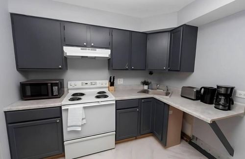 West Ridge Apartment | Cozy Studio Getaway Walk to Dining and Shops + Laundry