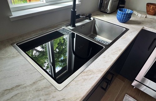 Helena West Side Apartment | Cozy studio with modern kitchen in unit laundry and AC close to hiking trails.