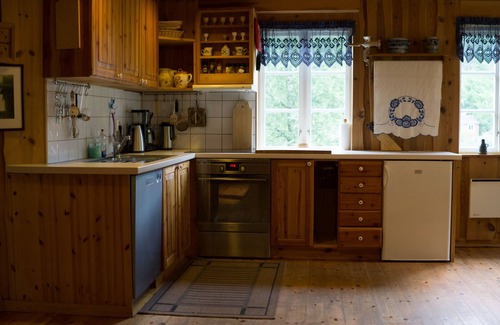 Strandvik House | Cozy three-bedroom cottage located on a working farm by the stunning BjornaFjord