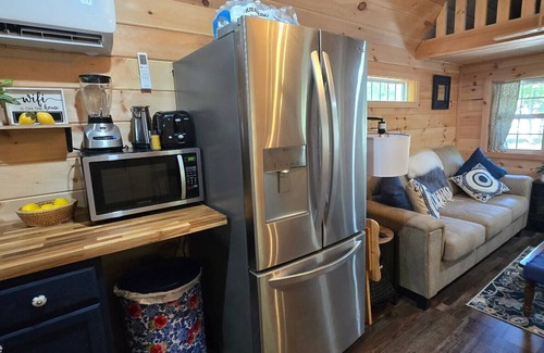 Cadiz Cabin | Cozy tiny house near Lake Barkley with fire pit, grill, & lake five minutes away