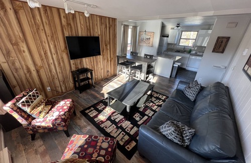 Willow Grove Condo | Cozy two Bedroom close to lake. Dogs Allowed. Semi private Hot Tub. Large Yard.
