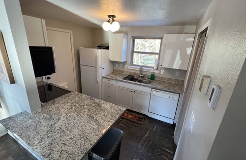 Willow Grove Condo | Cozy two Bedroom close to lake. Dogs Allowed. Semi private Hot Tub. Large Yard.