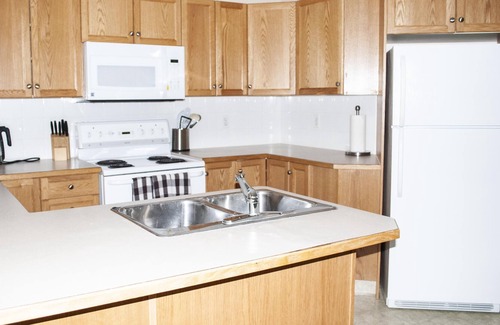 Red Deer Condo | Cozy Two Bedroom Plus a Den in Devonshire on the Park!