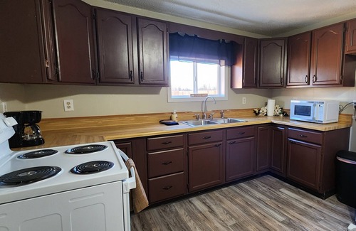 Celina House | Cozy updated home w/channel access, deck, firepit & huge yard!
