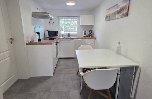 Gross Stroemkendorf Apartment | Cozy vacation apartment "Küstenkind" in a rural location in Groß Strömkendorf.
