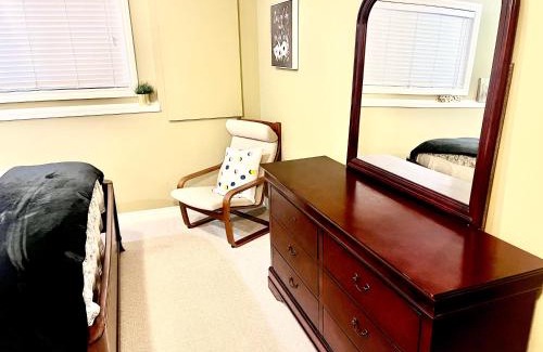 Southwest Calgary House | Cozy Walkout suite with King bed, Kitchen, Parking & Patio