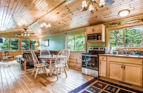 Lac du Flambeau House | Cozy Waterfront Cabin with Deck, Boat Dock, Kayak & Fire Pit