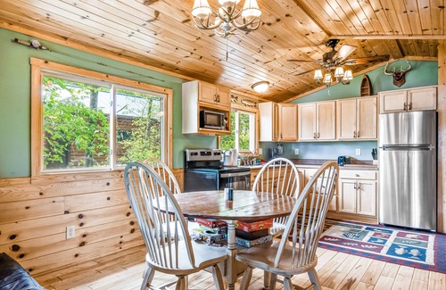 Lac du Flambeau House | Cozy Waterfront Cabin with Deck, Boat Dock, Kayak & Fire Pit