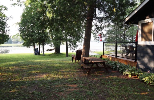 Gannon Village Cottage | Cozy Waterfront cottage on Buckhorn lake with hot tub