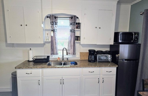 Scotts Cottage | Cozy Waterfront Cottage with Sandy Beach. Family friendly near many attractions.