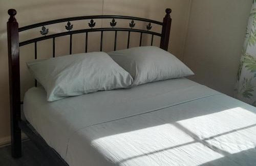 Haggatt Hall Apartment | CozyGetAway- US Embassy, MedPlus 10 mins away