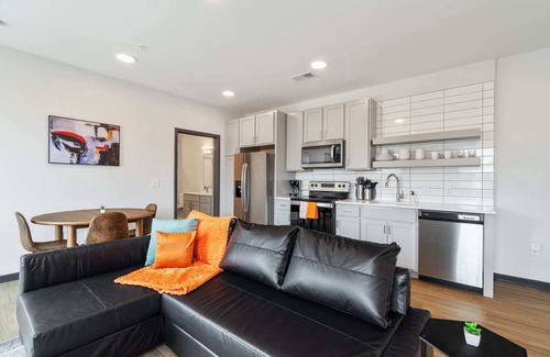 Lockerbie Square Apartment | CozySuites Mass with parking, lounge and roof deck 10