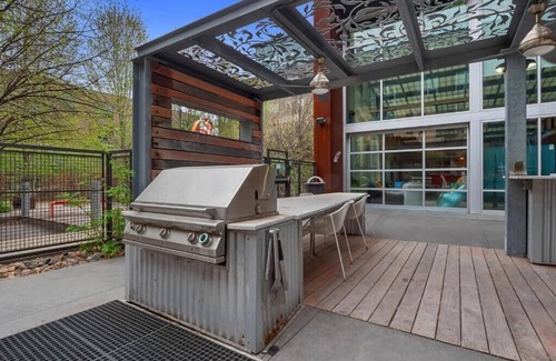 Mill District Apartment | Cozysuites Mill District Pool gym 10